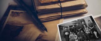 Colour photo of sepia-toned correspondence, including a black-and-white photo of a Japanese family in traditional dress.