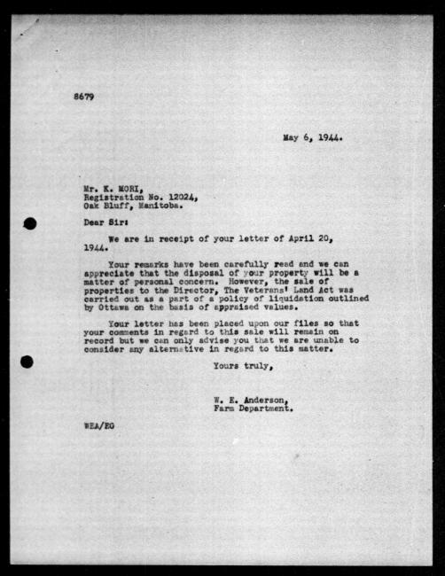 Scanned black-and-white microfilm of a typewritten reply letter to K. Mori from government representative WE Anderson regarding dispossession of their property.