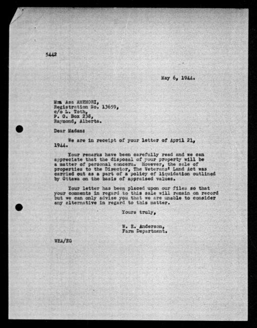 Scanned black-and-white microfilm of a typewritten reply letter to Asa Amemori from government representative WE Anderson regarding dispossession of their property.