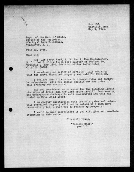 Scanned black-and-white microfilm of a typewritten copy of a letter addressed to the government from Yasushi Ohori regarding dispossession of their property.