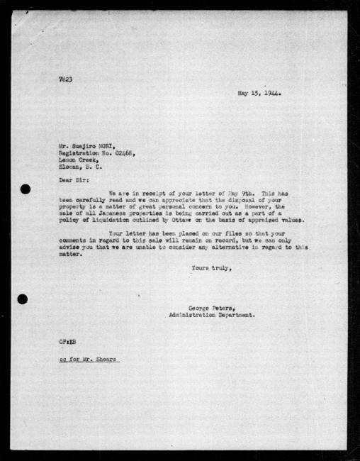 Scanned black-and-white microfilm of a typed reply letter to Suejiro Mori from government representative George Peters regarding dispossession of their property.