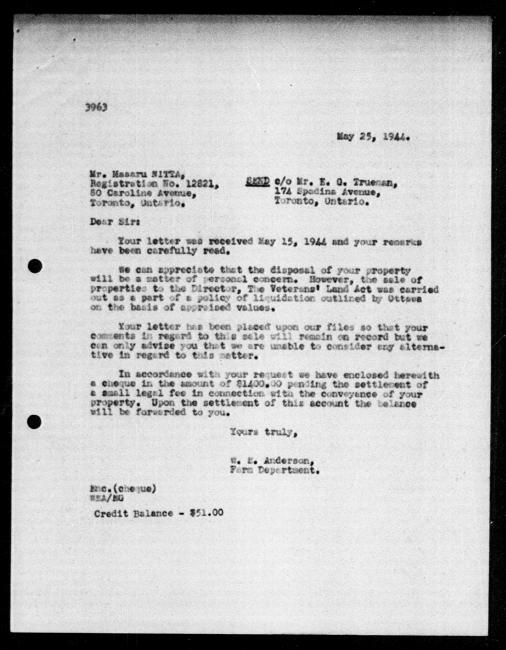 Scanned black-and-white microfilm of a typewritten reply letter to Masaru Nitta from government representative WE Anderson regarding dispossession of their property.