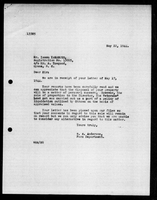 Scanned black-and-white microfilm of a typewritten reply letter to Isamu Yamamoto from government representative WE Anderson regarding dispossession of their property.