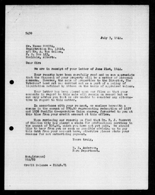 Scanned black-and-white microfilm of a typed reply letter to Yaozo Nomura from government representative WE Anderson regarding dispossession of their property.