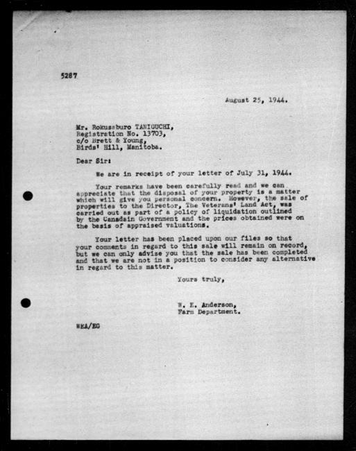 Scanned black-and-white microfilm of a typed reply letter to Rokusaburo and Mitsuye Taniguchi from government representative WE Anderson regarding dispossession of their property.