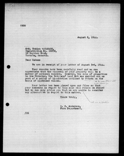 Scanned black-and-white microfilm of a typewritten reply letter to Takiya Watanabe from government representative WE Anderson regarding dispossession of their property. Includes handwritten annotations.