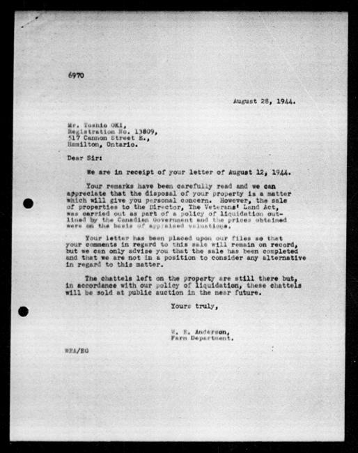 Scanned black-and-white microfilm of a typewritten reply letter to Toshio J Oki from government representative WE Anderson regarding dispossession of their property.