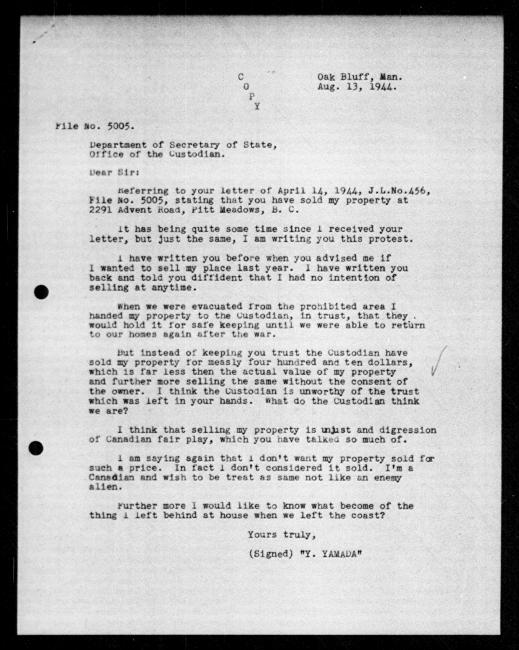 Scanned black-and-white microfilm of a typewritten copy of a letter addressed to the government from Yukio Yamada regarding dispossession of their property. Includes pencil checkmark marking by unidentified individual.