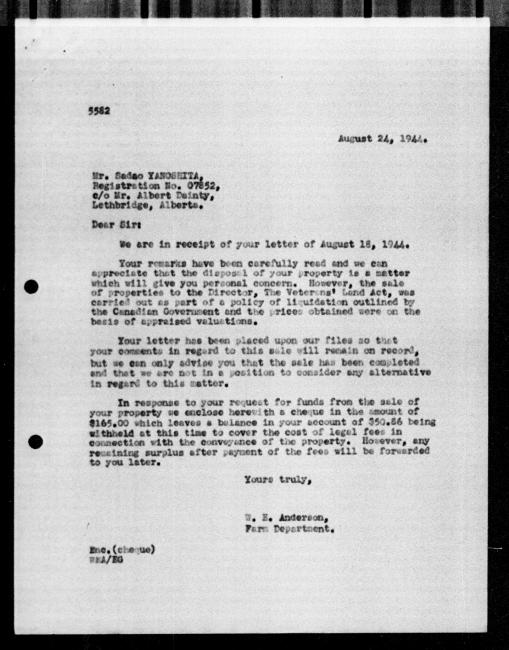Scanned black-and-white microfilm of a typed reply letter to Sadao Yanoshita from government representative WE Anderson regarding dispossession of their property.