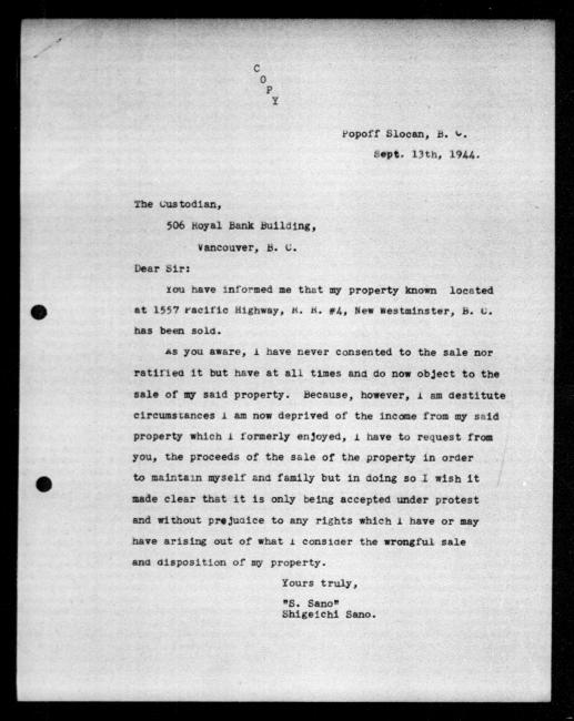 Scanned black-and-white microfilm of a typewritten copy of a letter addressed to the government from Shigeichi Sano regarding dispossession of their property.