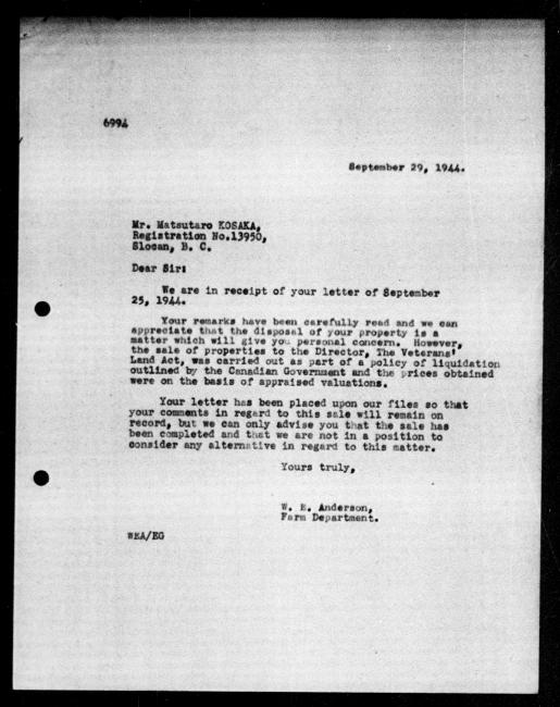 Scanned black-and-white microfilm of a typewritten reply letter to Matsutaro Kosaka from government representative WE Anderson regarding dispossession of their property.