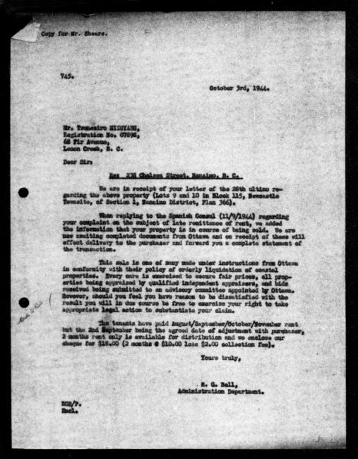 Scanned black-and-white microfilm of a typed reply letter to Mizuyabu Tsuneziro from government representative HG Bell regarding dispossession of their property. Handwritten comment on left hand margin.