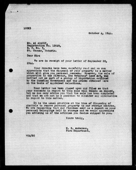 Scanned black-and-white microfilm of a typed reply letter to Ai Adachi from government representative WE Anderson regarding dispossession of their property.