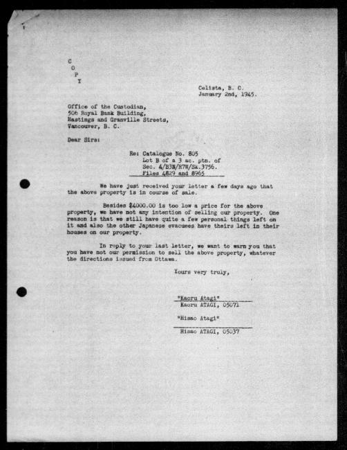 Scanned black-and-white microfilm of a typed reply letter to Kaoru and Hisao Atagi from government representative P Douet regarding dispossession of their property. Includes handwritten signature from author.