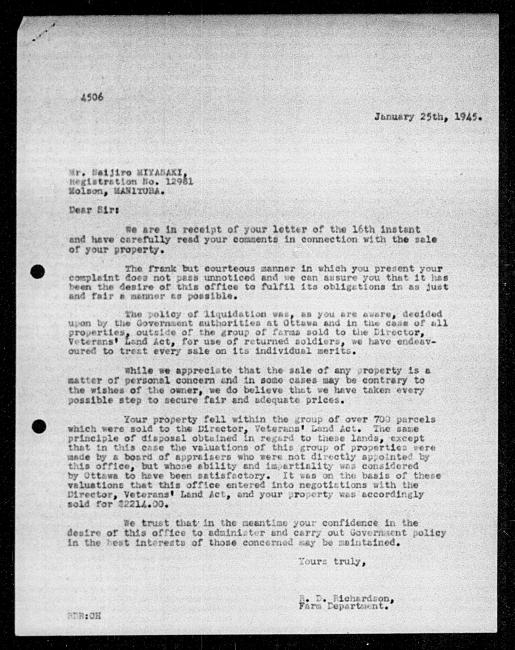 Scanned black-and-white microfilm of a typewritten reply letter to Saijiro Miyasaki from government representative RD Richardson regarding dispossession of their property.