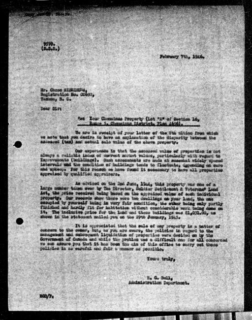 Scanned black-and-white microfilm of a typed reply letter to C Nishimura from government representative RG Bell regarding dispossession of their property.