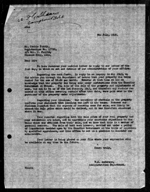 Scanned black-and-white microfilm of a typewritten reply letter to Yoshio Tanaka from government representative WE Anderson regarding dispossession of their property.