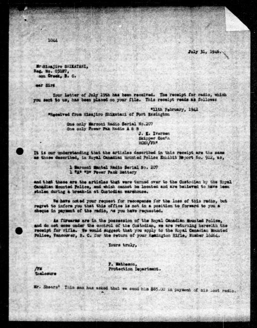 Scanned black-and-white microfilm of a typewritten reply letter to Hisajiro Shikatani from government representative F Matheson regarding dispossession of their property.