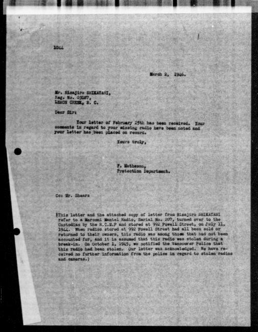 Scanned black-and-white microfilm of a typed reply letter to Hisajiro Shikatani from government representative Flora Matheson regarding dispossession of their property.