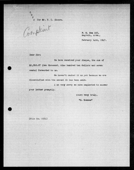 Un microfilm noir et blanc scanné d'une copie dactylographiée d'une lettre adressée au gouvernement de M. Nakane concernant la dépossession de sa propriété. Il y a des annotations manuscrites.