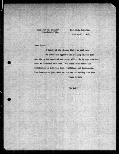 Un microfilm noir et blanc scanné d'une copie dactylographiée d'une lettre adressée au gouvernement de K Aoki concernant la dépossession de sa propriété.